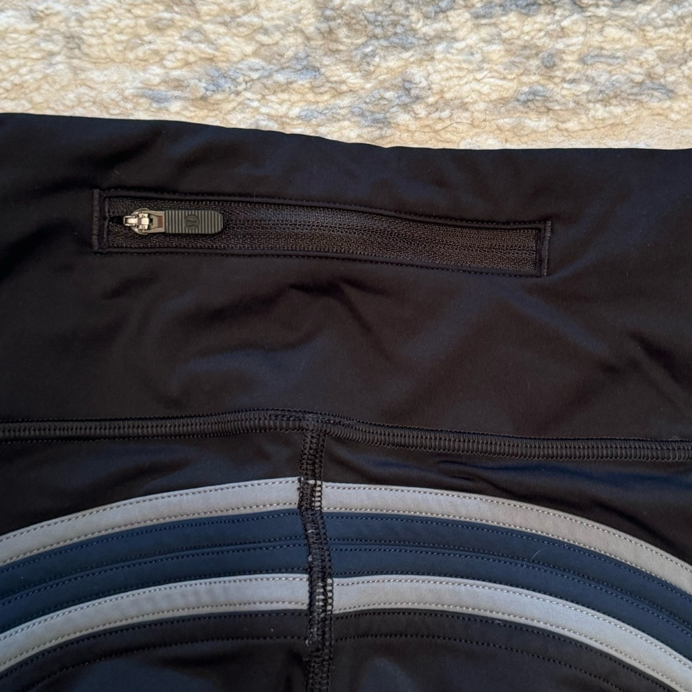 Lululemon Run Crew Tight Leggings
Black / True Navy / Steam Blue, Size 6 - Picture 8 of 11